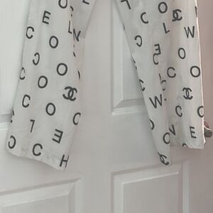 Elegant White Wide Leg Pants with Logo Design